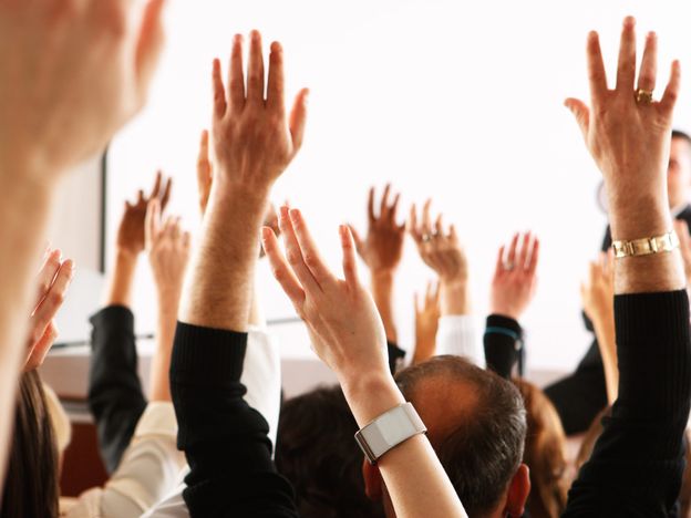Large group of seminar audience in class room