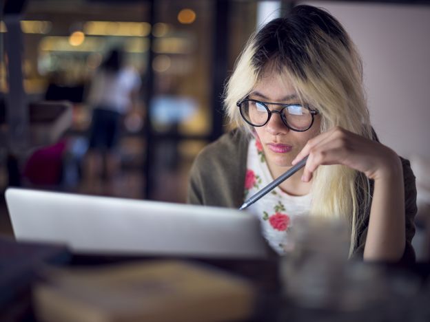 Woman laptop working planning thinking concept