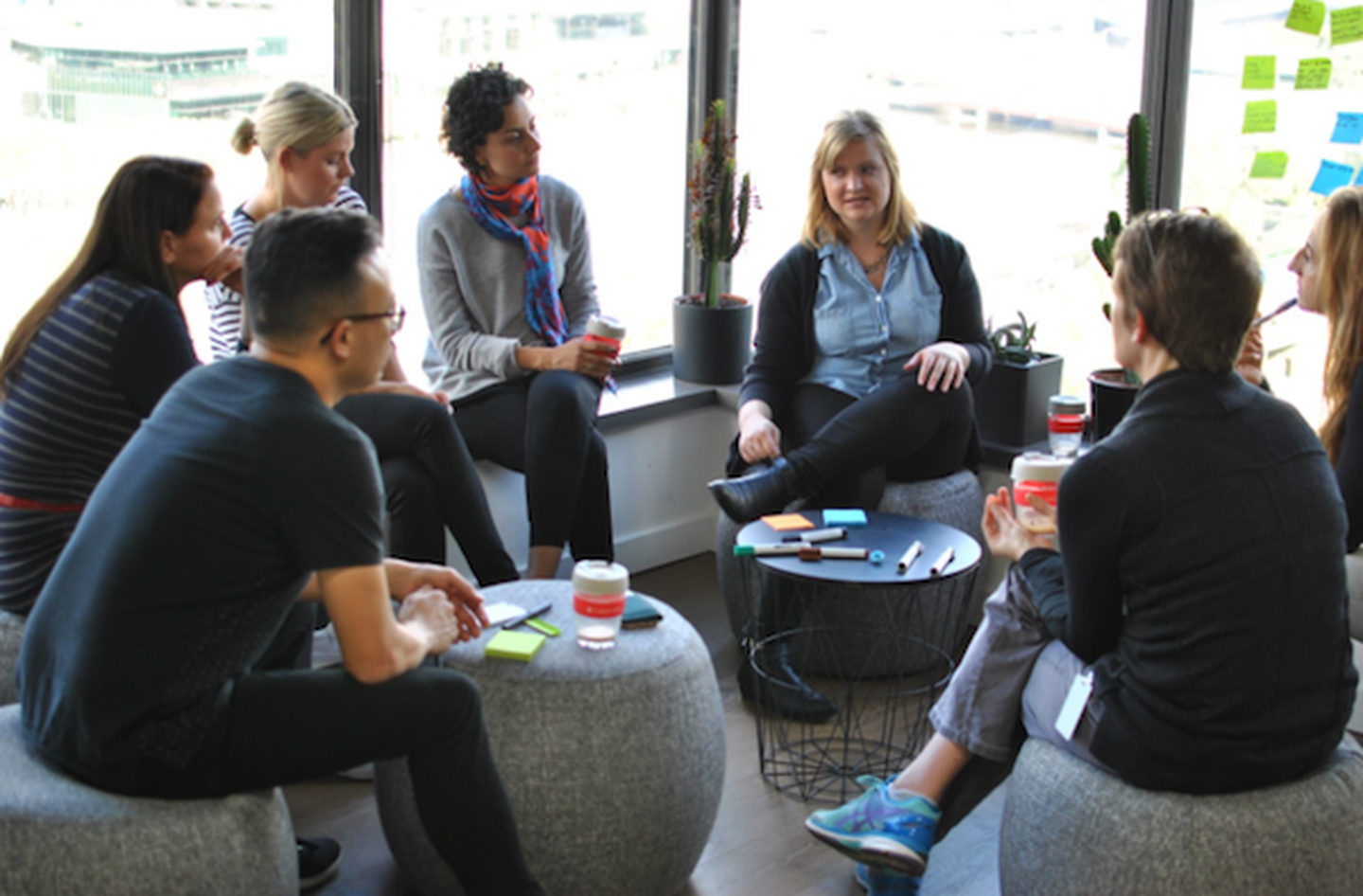 Hackathon teams collaborating at Culture Amp's Melbourne office