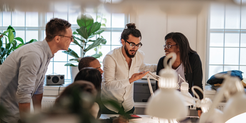 Group of employees speaking together