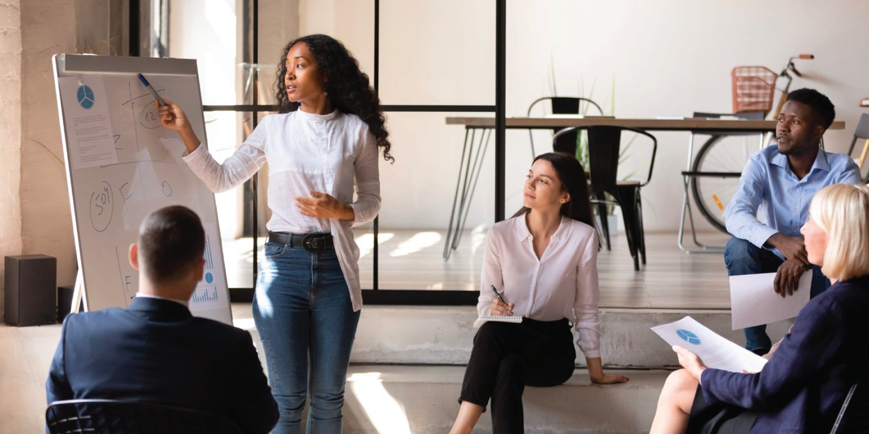 A group of people at a company meeting