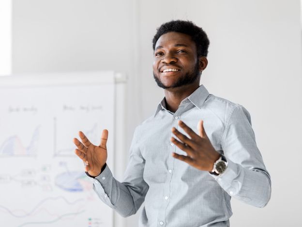 Businessman with flip chart at office presentation