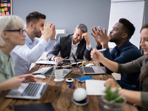 Business people arguing in meeting