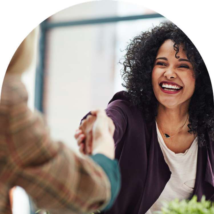 Woman in business attire leading a meeting