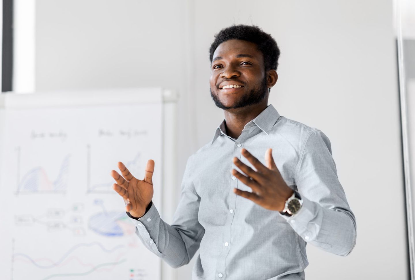 Businessman with flip chart at office presentation