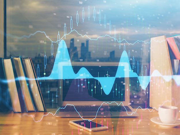 Financial graph colorful drawing and table with computer on background double exposure concept of international markets