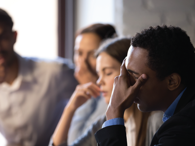 Frustrated team dealing with the loss of a high performer