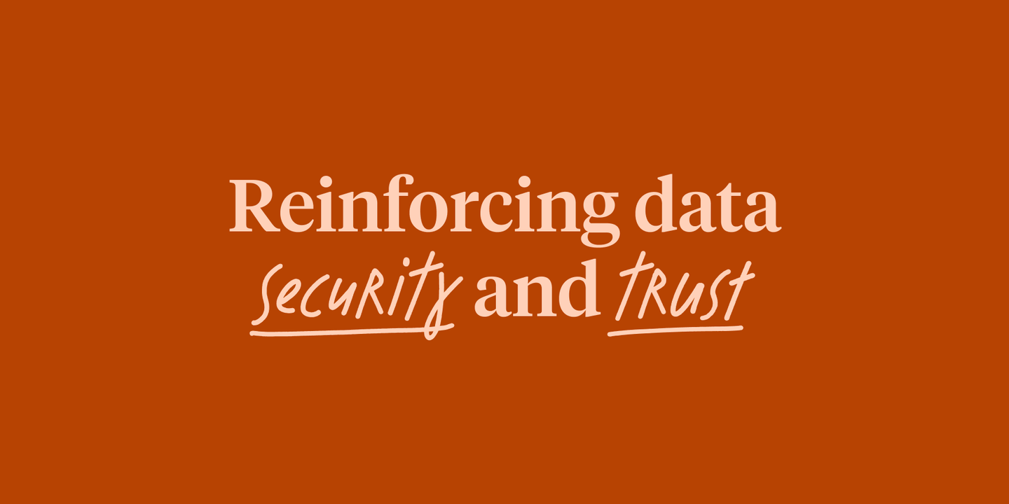 Text reading "Reinforcing data security and trust" on an orange background
