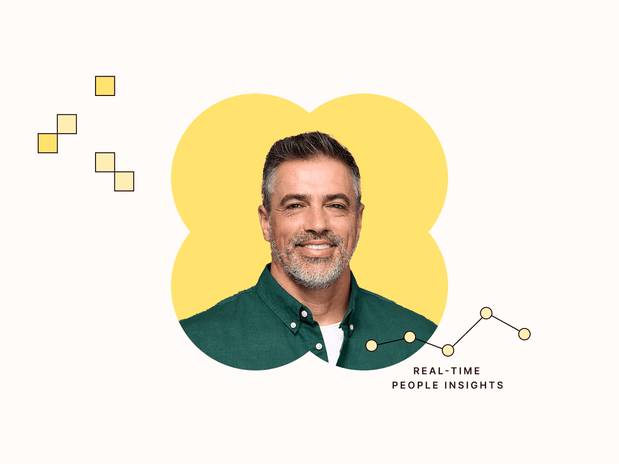 man in green button up shirt in front of yellow background