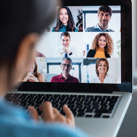 Person on a video call with team members