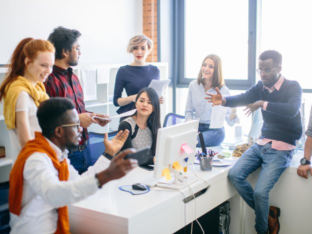 Closeup portrait of successful company with people of different ethnic origions