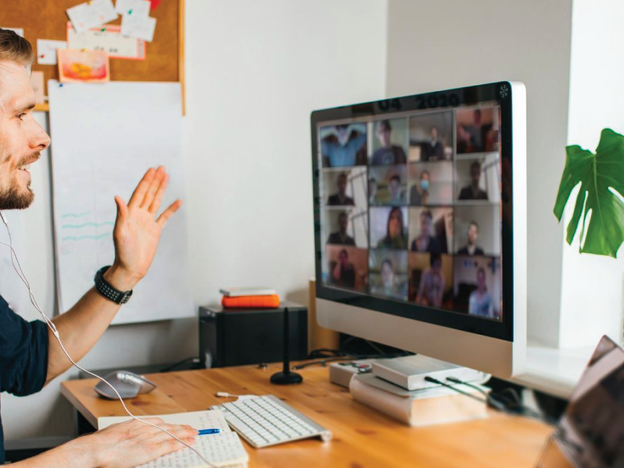 Young manager in a video conference with other people