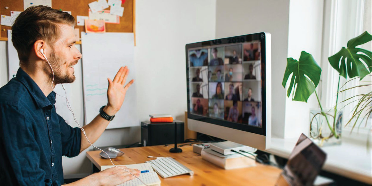 Young manager in a video conference with other people