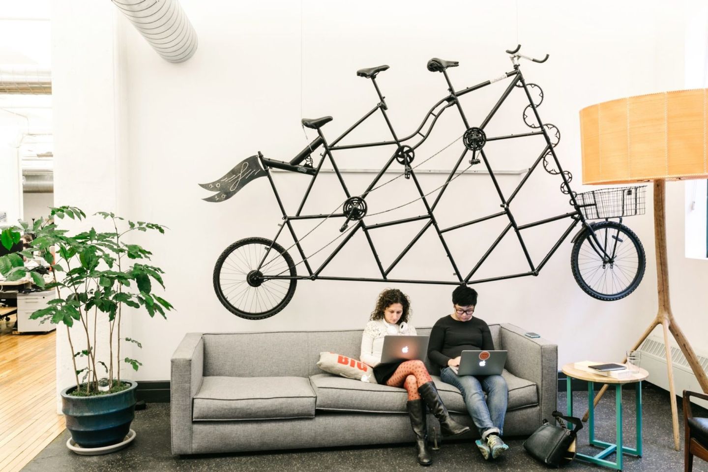 Etsy employees sitting in the Etsy office