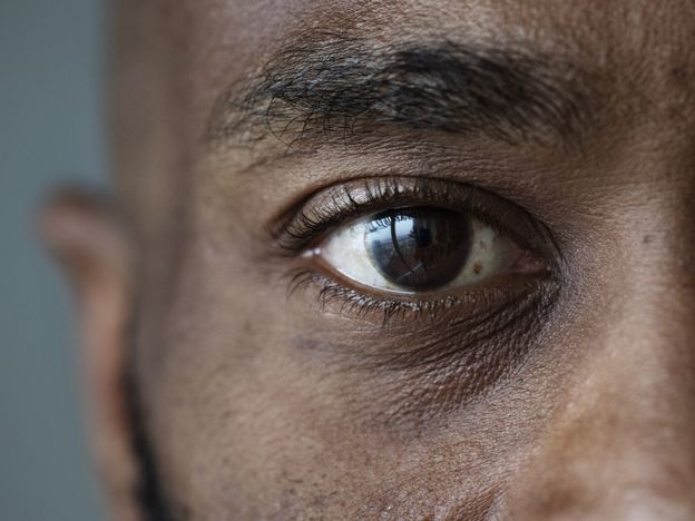 Closeup of an eye of a black man