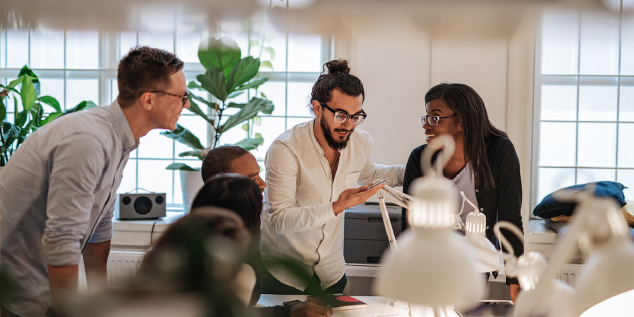 Group of employees speaking together