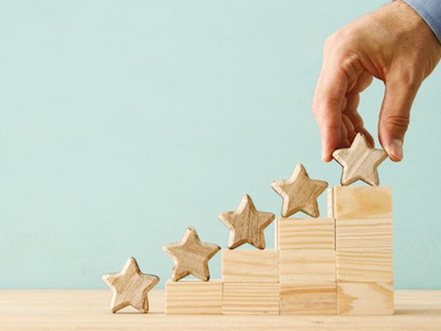 Concept image of setting a five star goal increase rating or ranking evaluation and classification idea 2