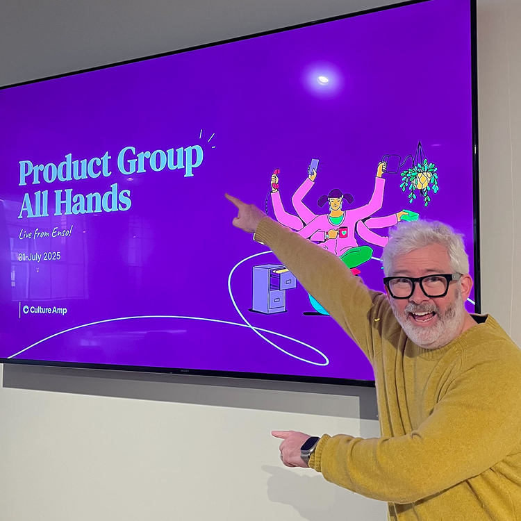 Culture Amp employee presenting at an internal company event