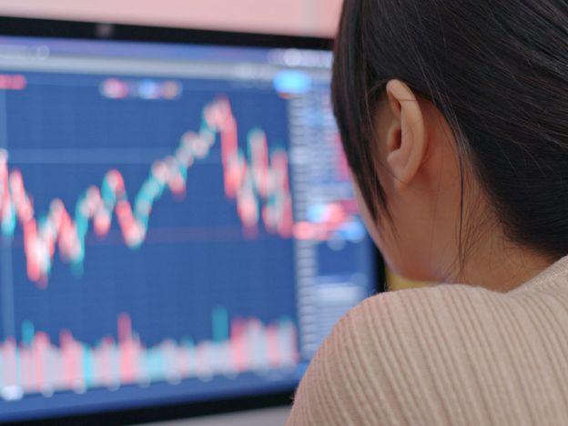 Woman study the stock market data