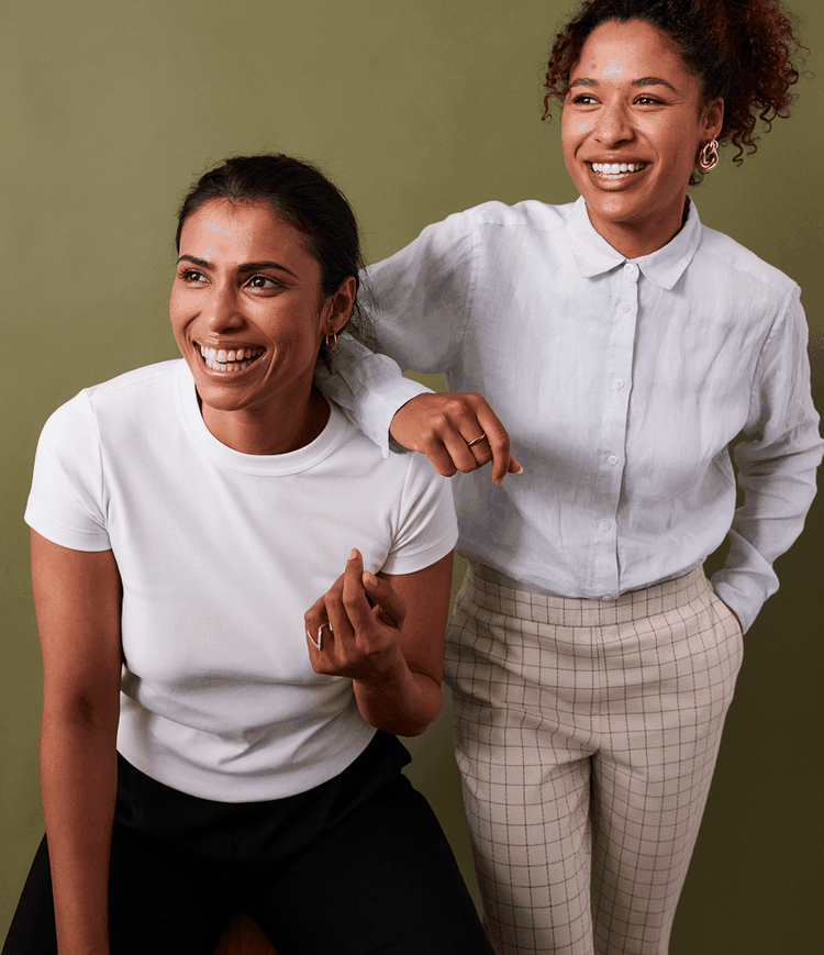 Two women colleagues smiling