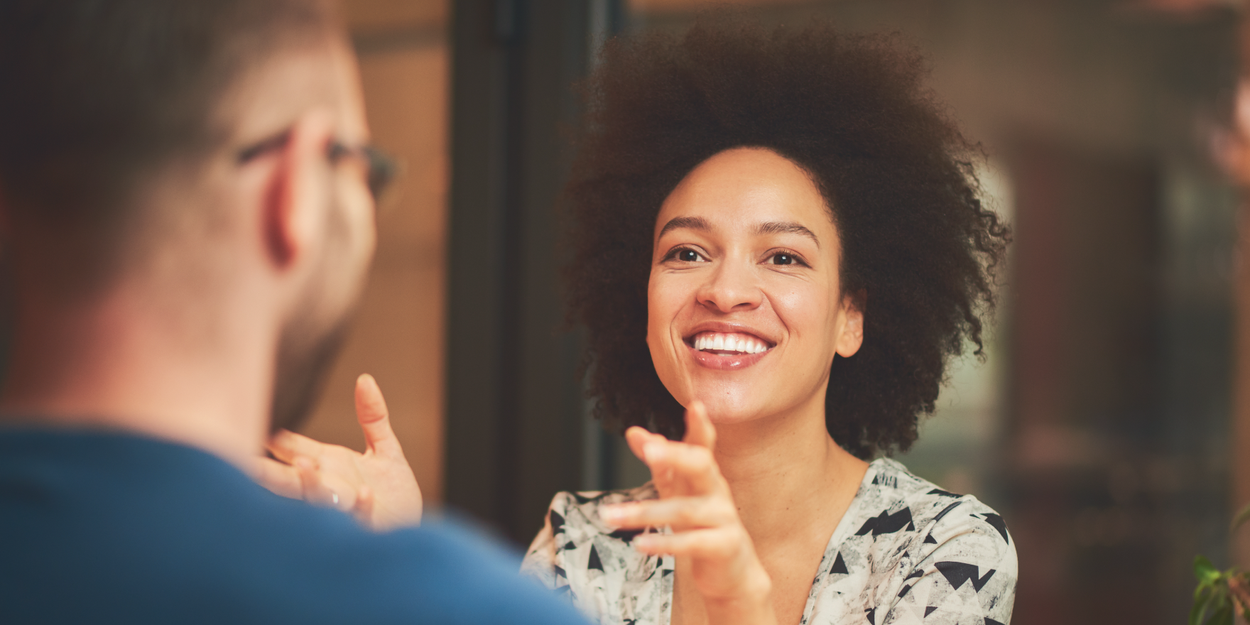 Two employees talking to each other